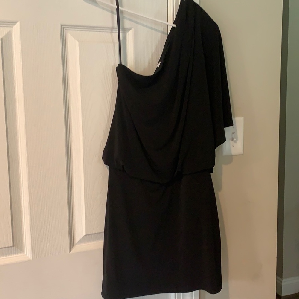 Off the shoulder black dress.